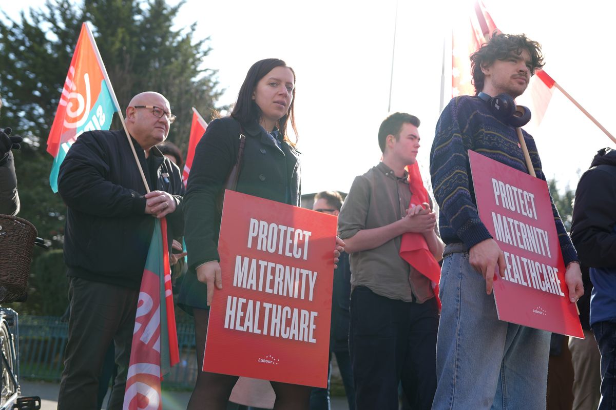 People take part in an International Women's Day rally organised by the Labour Party at the Garden of Remembrance in Dublin City Centre, supporting the Rotunda Hospital, and maternity healthcare. 