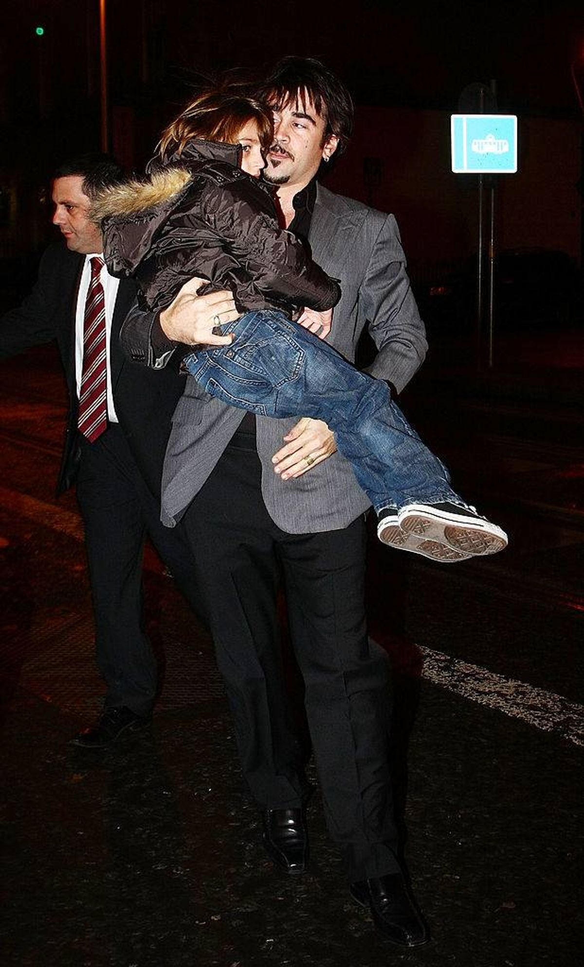 Colin Farrell arrives with his son James