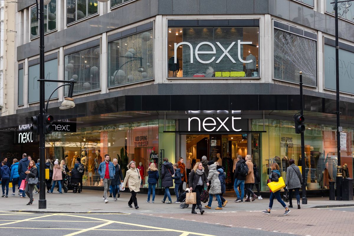 People walk past a branch of Next in Oxford Street, London, UK on January 03, 2019