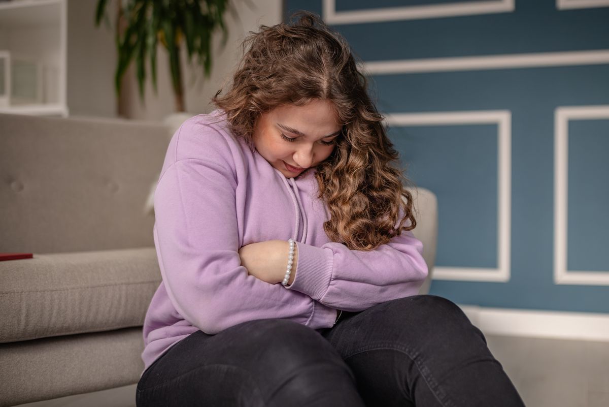 Woman with stomach pain