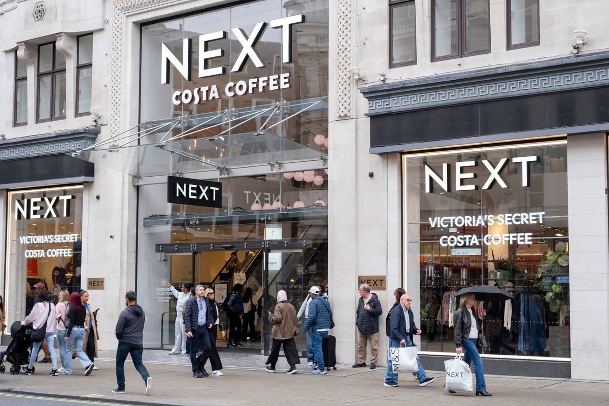Shoppers and visitors outside Next on Oxford Street on 1st October 2025 in London, United Kingdom