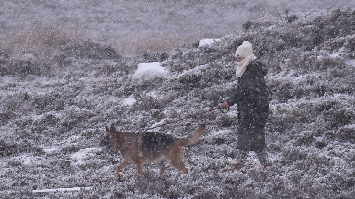A walker in the snowy conditions at the Wicklow Gap mountain pass in Co Wicklow. 