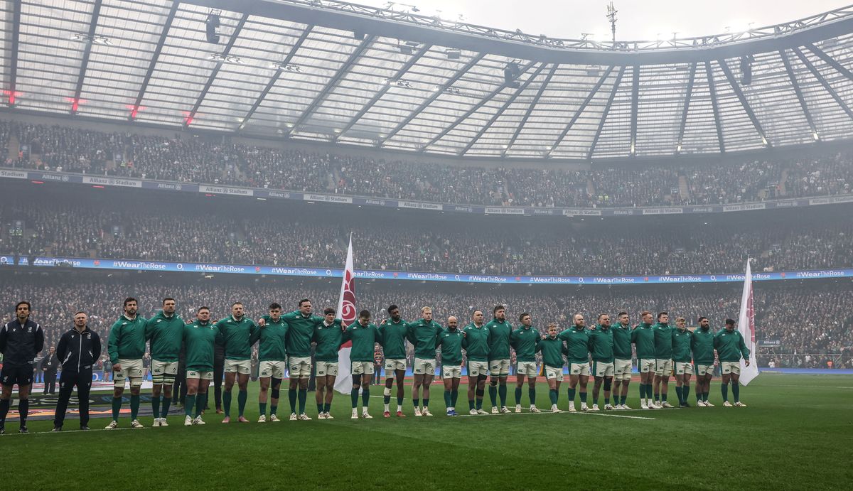 The Irish team stand for the national anthems