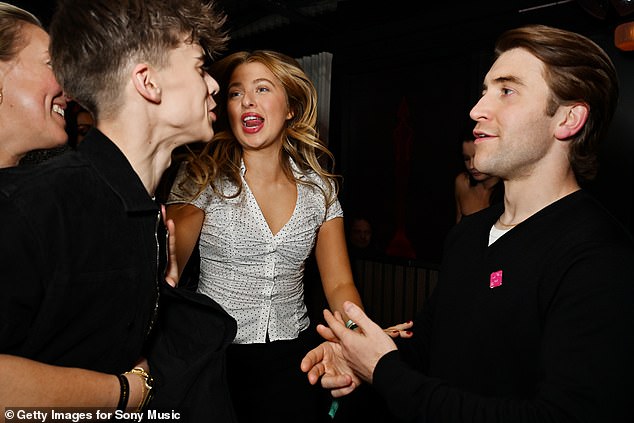 And they came along to let their hair down at the star-studded afterparty at Soho House Manchester, joined by Anaïs' boyfriend Callum Scott Howells (L-R Donovan, Anais, Callum)