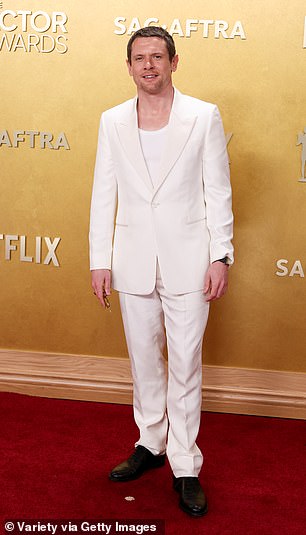 Jack O'Connell opted for an all white suit with black shoes