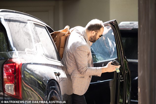 Sandilands' longtime manager Bruno Bouchet arrived at his client's Vaucluse mansion late Thursday morning