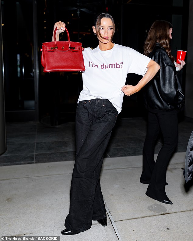 Maura held up her new prized £17K handbag as she stepped out in the Big Apple