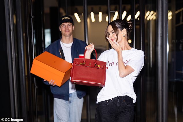 'This is my win,' Maura boasted as Rob handed her the pricey handbag. 'I knew I'd have my moment.' After sharing a big hug with Rob, Maura assured him, 'You're forgiven!'