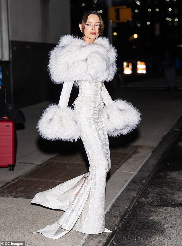 Maura Higgins turned heads in a wild fur-trim corset dress as she arrived at Watch What Happens Live With Andy Cohen in New York on Tuesday evening