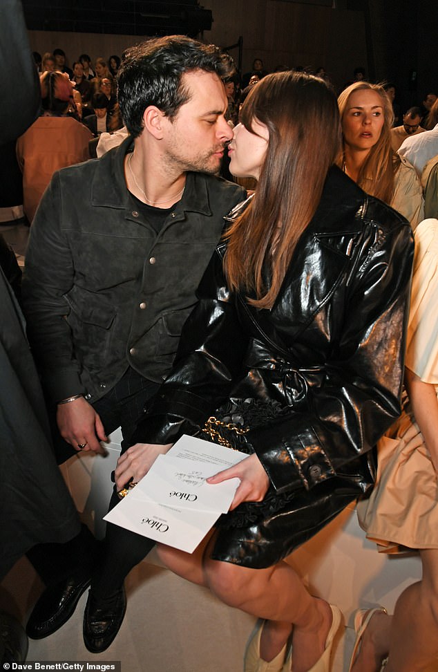 Aimee Lou Wood can't resist passionately kissing boyfriend Adam Long as they attended the Chloe show in Paris on Wednesday alongside ethereal Alexa Chung for Paris Fashion Week