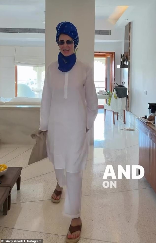 Trinny admitted she didn't want to have to wash her hair so swept her locks up into a wrap using a blue scarf