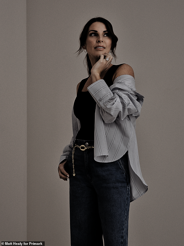 For her third look, Coleen slipped into a sleek black vest top paired with a striped white shirt and light blue denim jeans