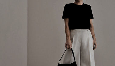 Coleen Rooney looked effortlessly stylish as she modelled six stunning looks from her new Primark collection on Thursday (including this chic black shoulder-pad T-shirt)