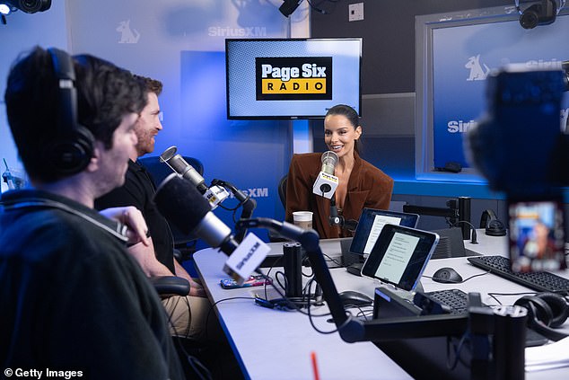 The star, who is currently on a US press tour following her appearance on The Traitors US, appeared in great spirits as she caught up with Danny Murphy and Evan Real on the show