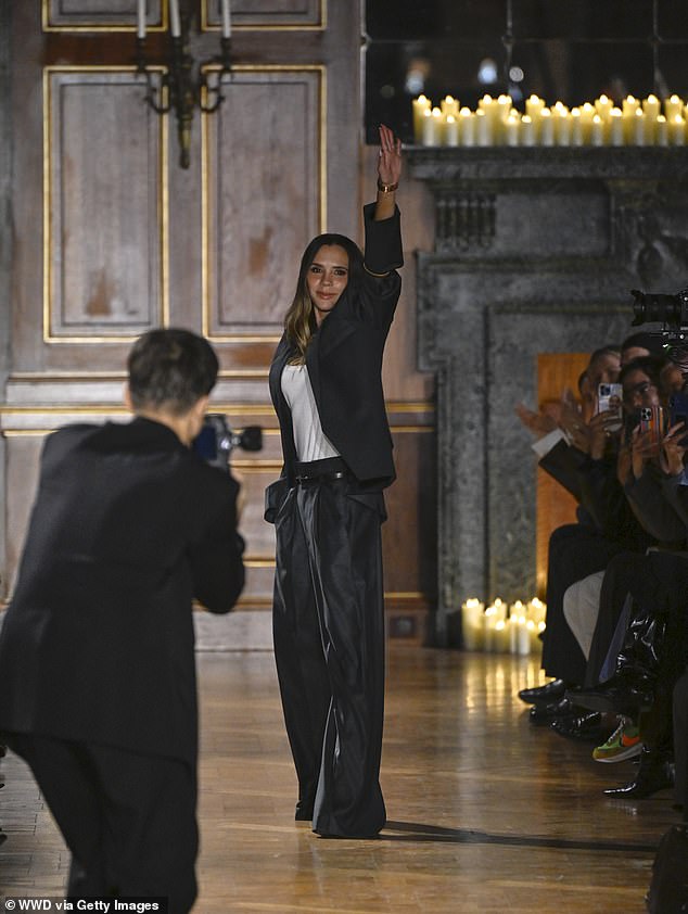 The video comes as Victoria was supported by her husband David and children Romeo, Cruz and Harper at her Paris Fashion Week show on Friday evening