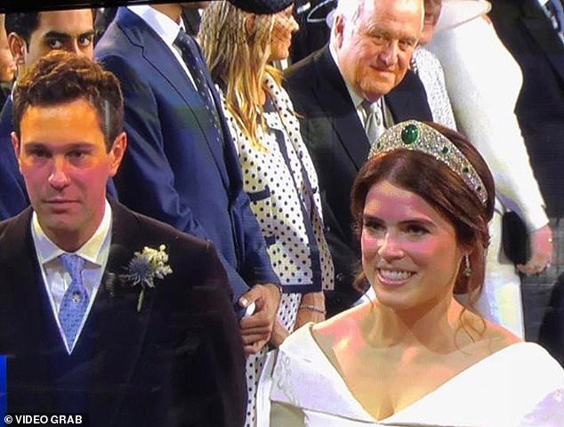 David Rowland, in the back, can be seen during Princess Eugenie's wedding to Jack Brooksbank