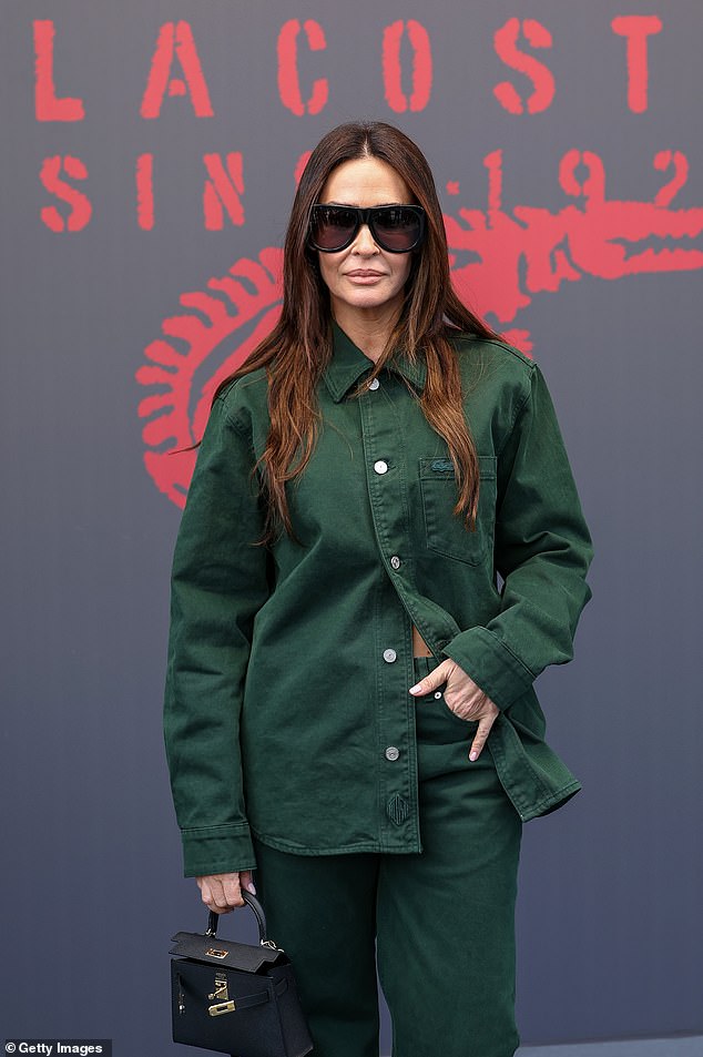 Vicky Martin looked classy in a green button-up shirt, matching trousers, and a black Hermès bag