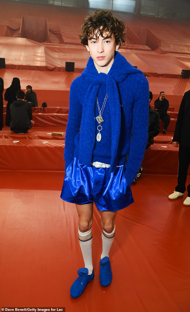 Daniel Millar branched out with the colour scheme and arrived in blue shiny shorts, matching trainers and knee-length socks