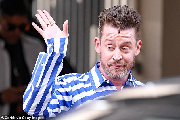 He gave a wave to the crowd during his kooky appearence