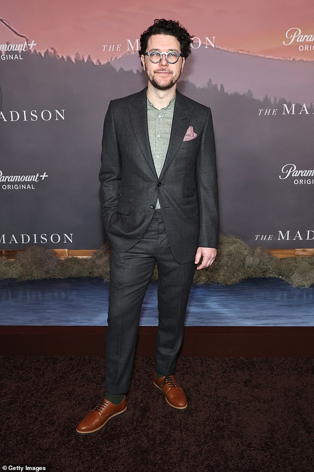 Breton Vivian sported a dark grey suit paired with a grey shirt as he arrived on the red carpet