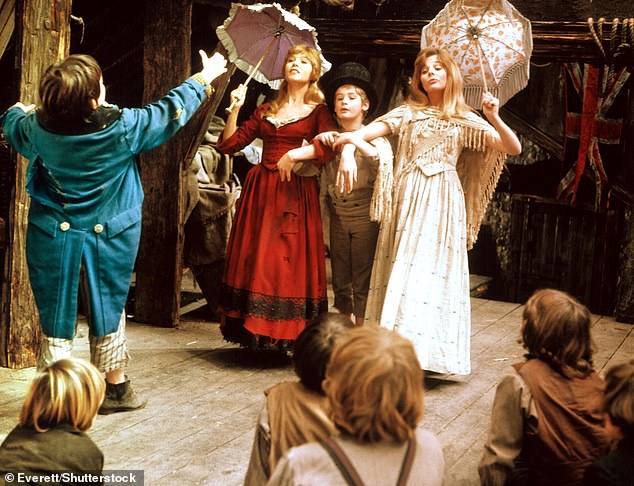 Film viewers will remember Shani for her role as Nancy in 1968's Oliver! Seen here with co-stars Jack Wild (The Artful Dodger), Mark Lester (Oliver Twist) and Sheila White as Bet