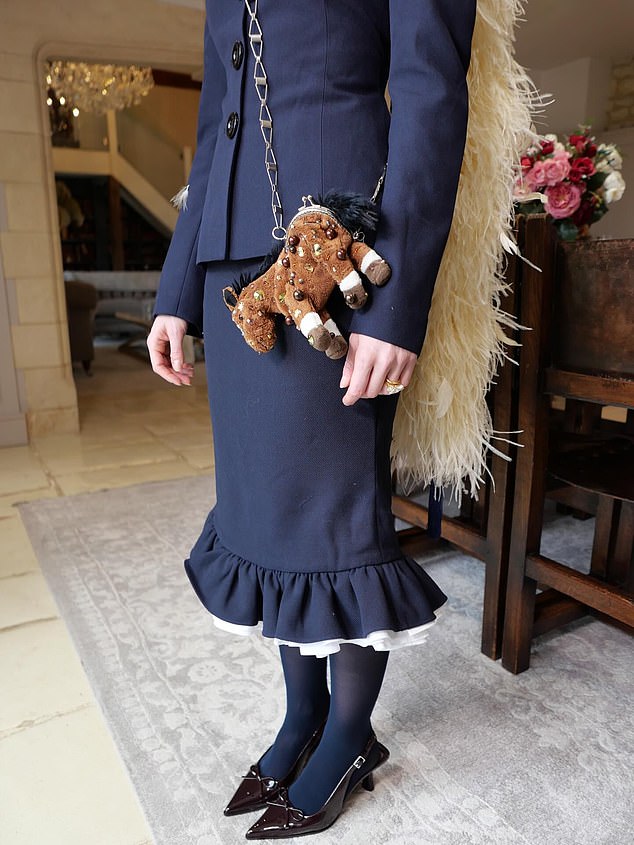 Georgia's horse bag injected some of her trademark fun into the look