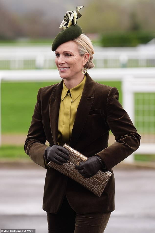 Zara looked chic in a brown velvet soon and crocodile print handbag