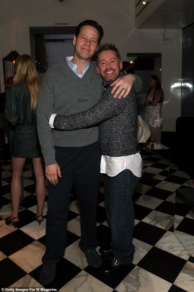 Ike Barinholtz and Macaulay posed for a sweet snap inside the party