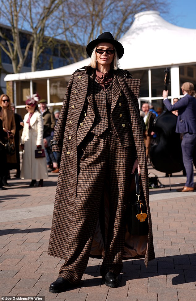 Jodie Kidd opted for a houndstooth  suit with a matching coat and black shoes