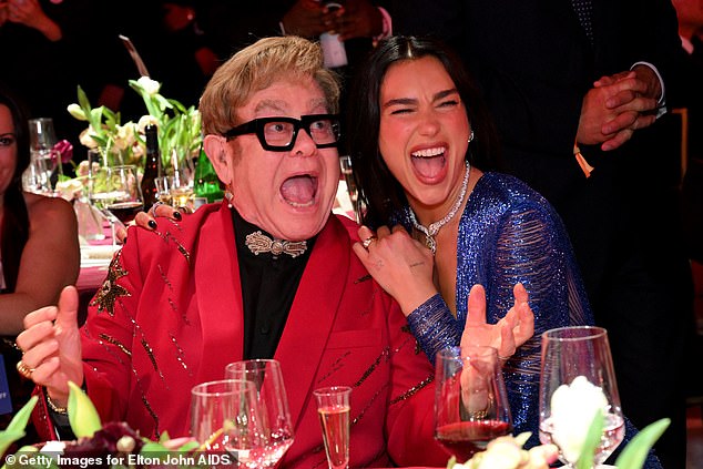 Elton John and Dua Lipa enjoyed a welcome reunion six years after topping the charts together as she attended his star-studded Oscars viewing party on Sunday
