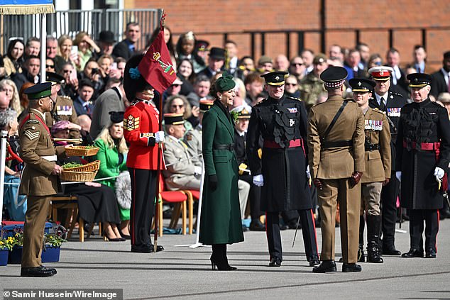 The Irish Guards were founded in 1900 by Queen Victoria, and the custom of handing out shamrocks began in 1901. Pictured: Princess Kate at today's parade