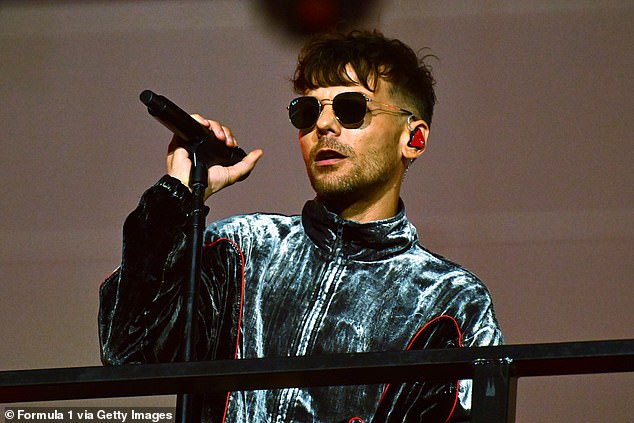 Fans accused Louis of 'throwing shade' at Harry after he released music on the same day as the icon