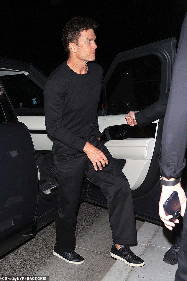 Tom Brady looked cool in all black as he arrived for the party