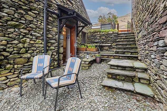 The Fold, a converted 19th-century cow barn, sleeping two, with views of Helm Crag