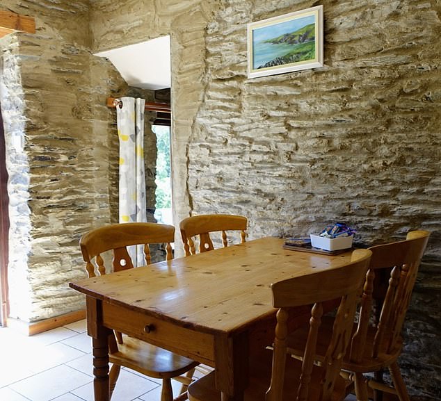 Oak Cottage, at Troedyrhiw, has two bedrooms and a cosy living room with a wood-burner