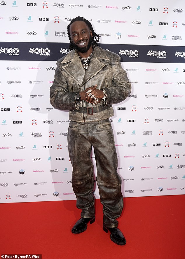 Kojey, 33, kept things cool in a washed leather jacket and matching trousers
