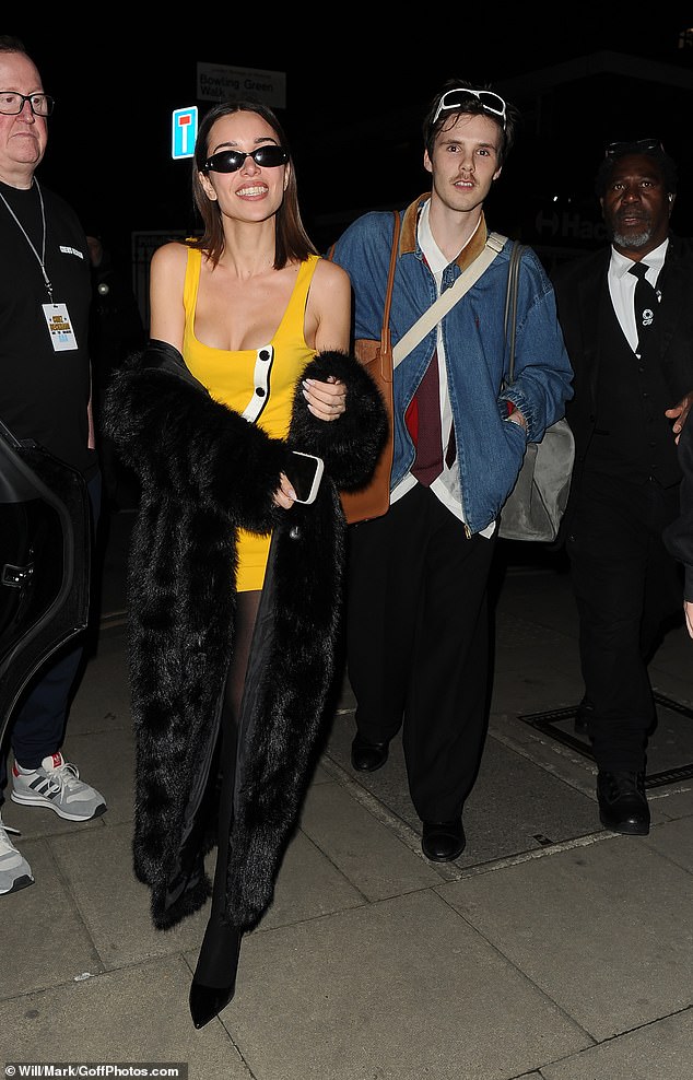 Cruz Beckham was supported by girlfriend Jackie Apostel at his penultimate UK gig in London on Thursday after breaking down over single 'inspired by Brooklyn's estrangement'