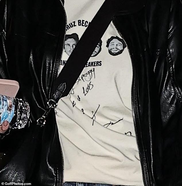 David's sister departed the gig rocking the band's signed merch, a T-shirt with Cruz and his band's faces printed on