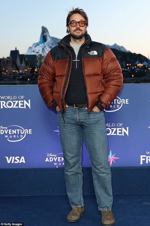 French actor Lucas Bravo, known for Emily In Paris, also made an appearance wearing a black and red North Face padded jacket