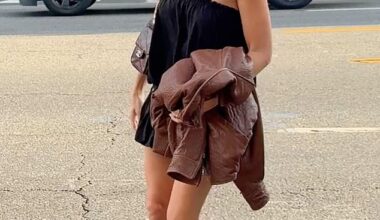 Margot Robbie, 35, looked effortlessly chic in a strapless playsuit as she partied the night away with Cara Delevingne and Stella McCartney in LA on Saturday