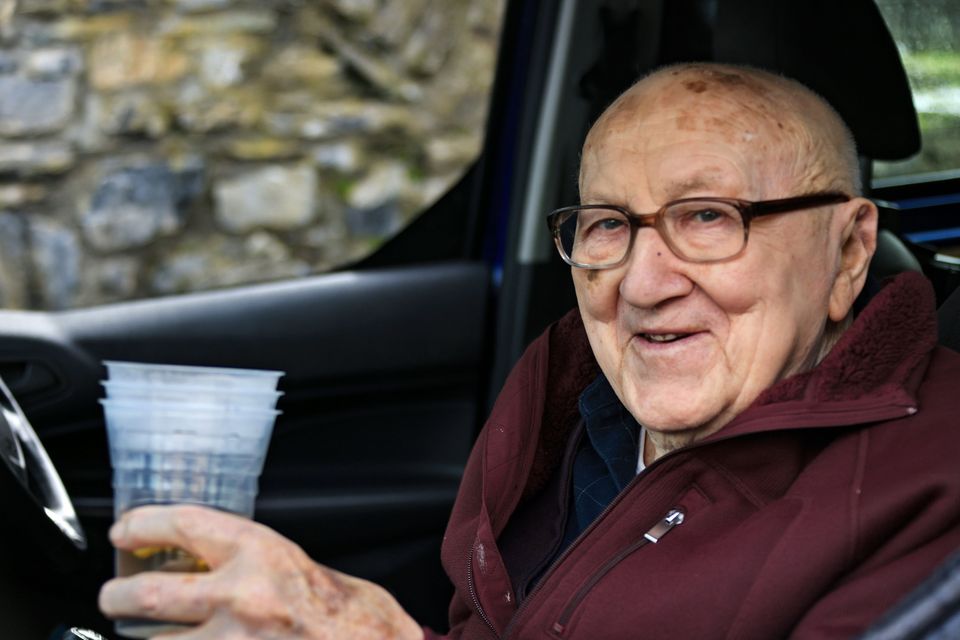 Denis O'Connor, enjoying his little tipple from his car, in  the St Patrick's Festival Parade in Killarney town on Tuesday  organised by Killarney Chamber of Tourism and Commerce. Photo by Valerie O'Sullivan. 