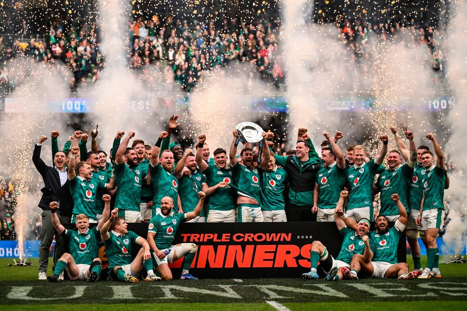 Ireland captain Caelan Doris lifts the Triple Crown trophy after his side's victory over Scotland. Photo: Brendan Moran/Sportsfile