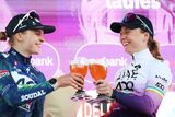 thumbnail: Lara Gillespie toasts her win with second-place Marthe Goossens of Belgium. Photo: Getty