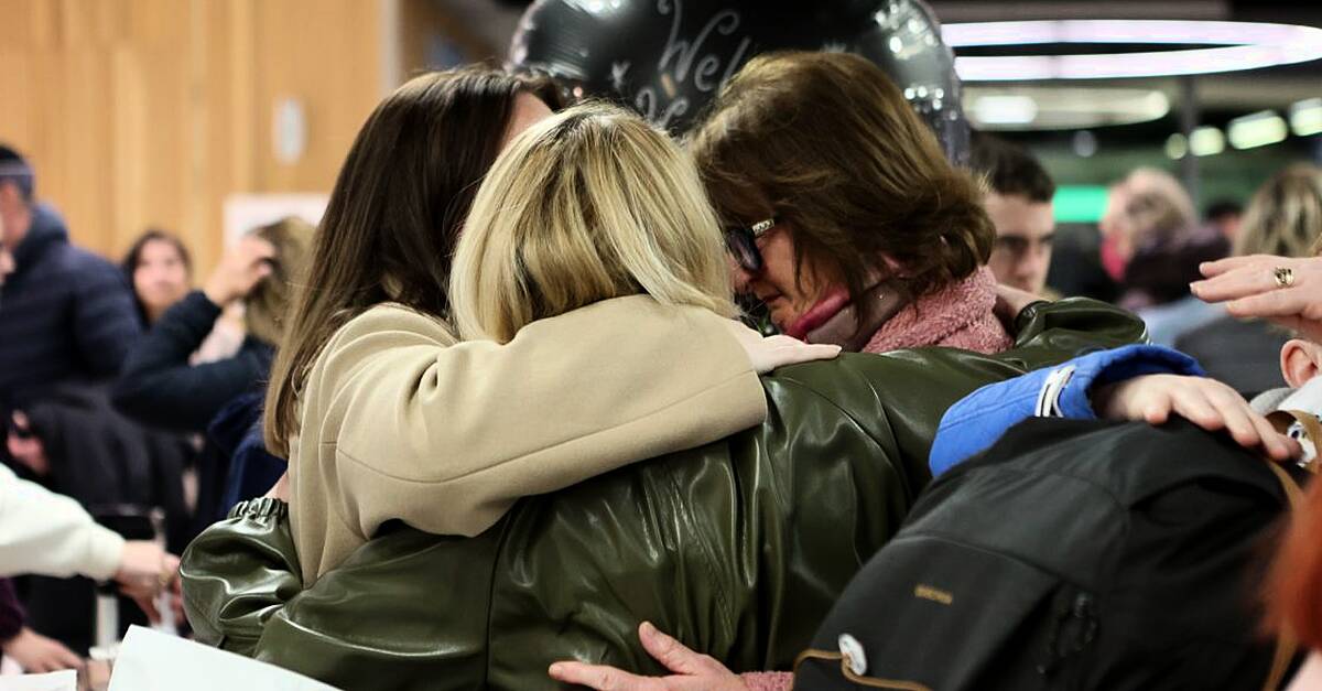 Relieved family reunions at Dublin Airport as chartered flight lands