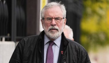 Gerry Adams arrives at High Court for bombings trial