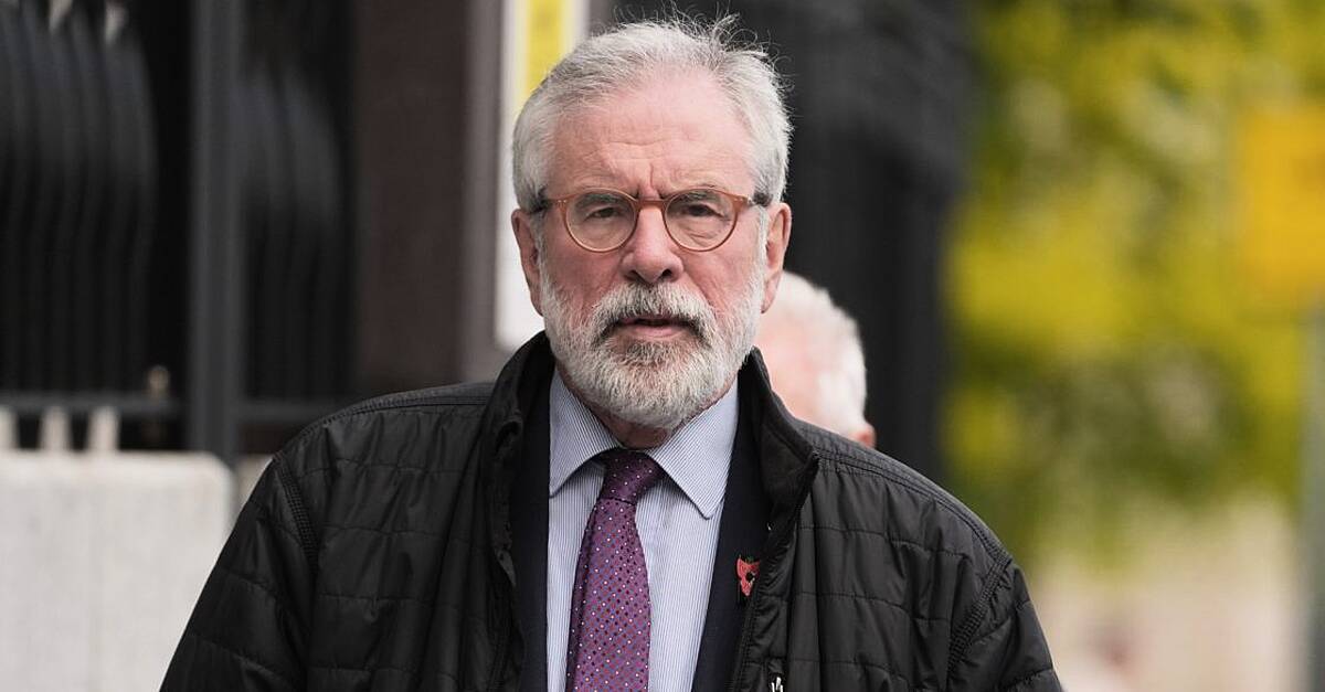 Gerry Adams arrives at High Court for bombings trial