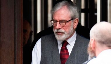 Gerry Adams appears to wear protective vest as civil case hears he was ‘directly responsible’ for England bomb decisions