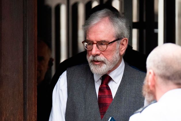 Gerry Adams appears to wear protective vest as civil case hears he was ‘directly responsible’ for England bomb decisions