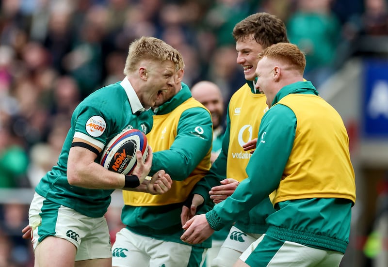 Ireland's Tommy O'Brien celebrates scoring a try against England. Photograph: Inpho