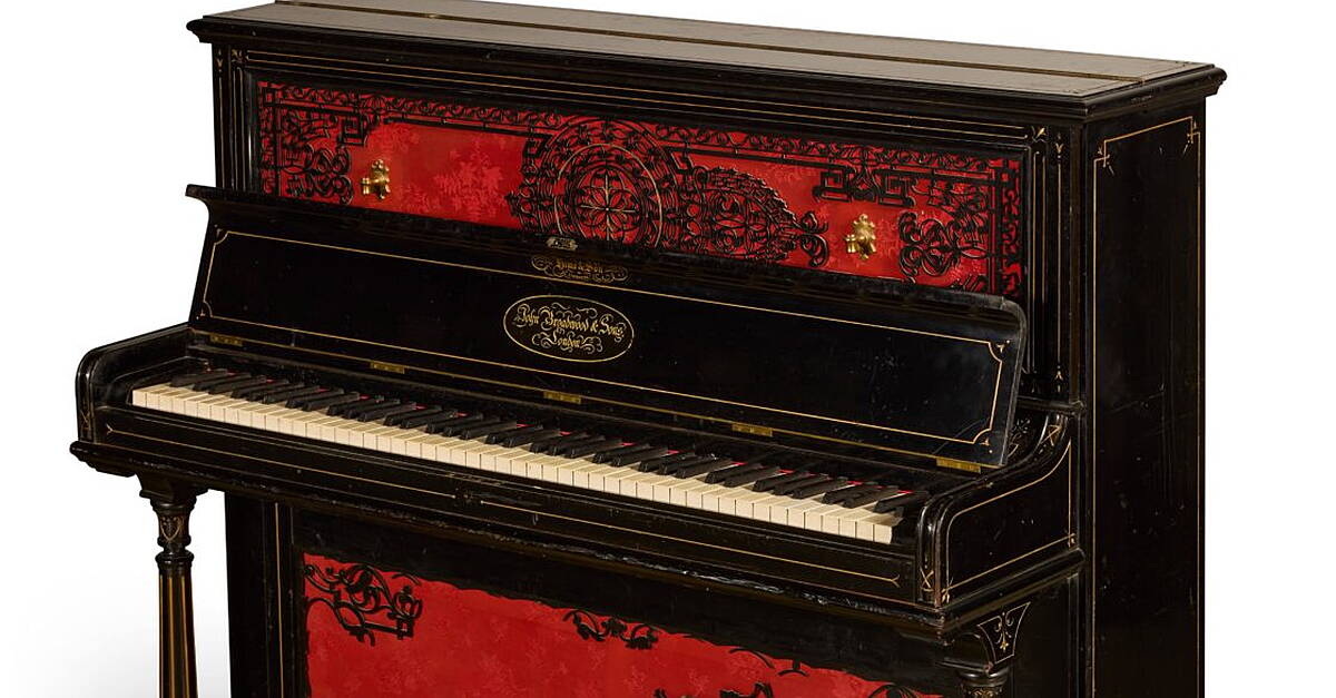 Piano John Lennon used to write Beatles songs fetches record amount at auction